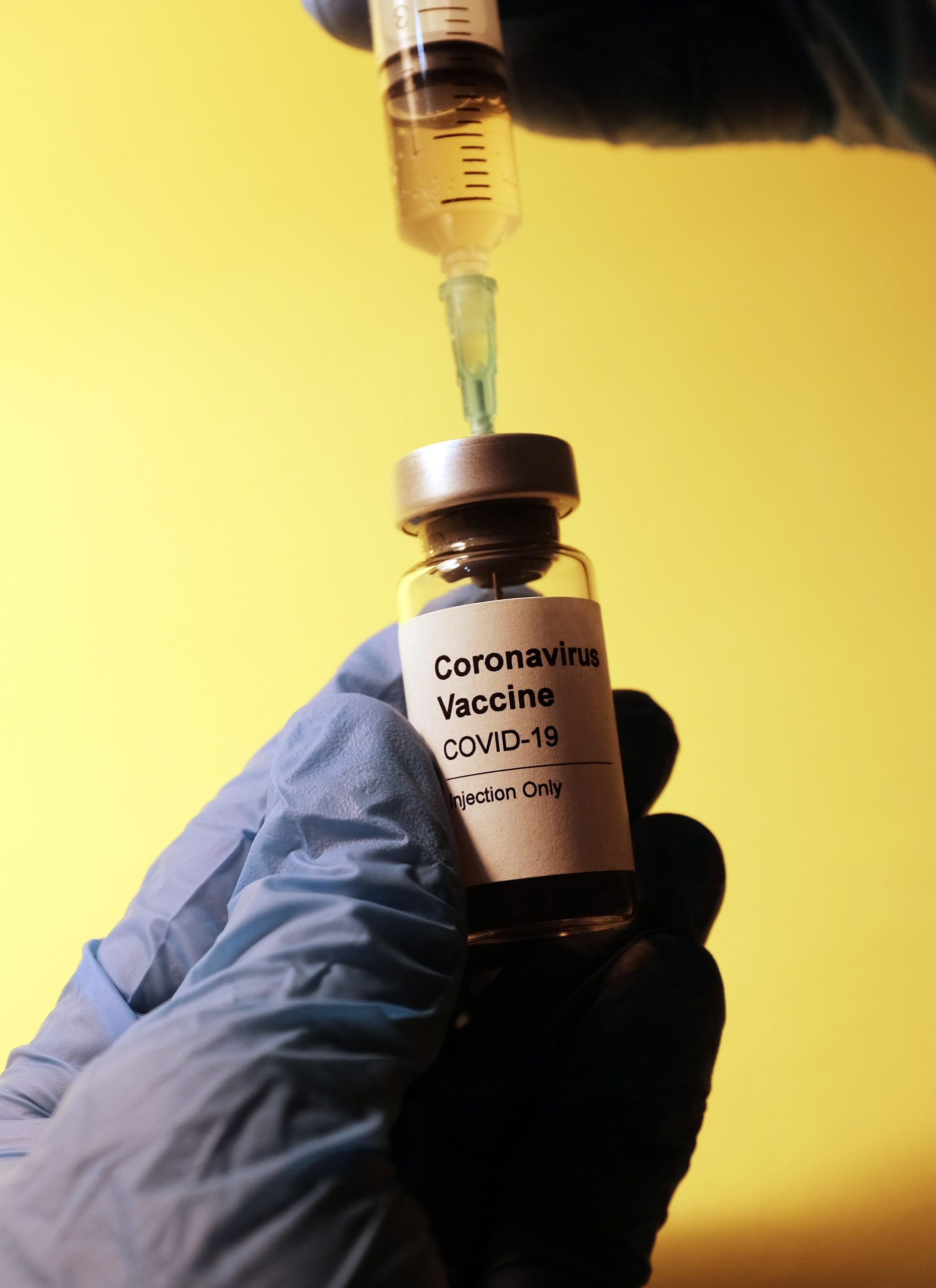 Vaccine bottle with syringe