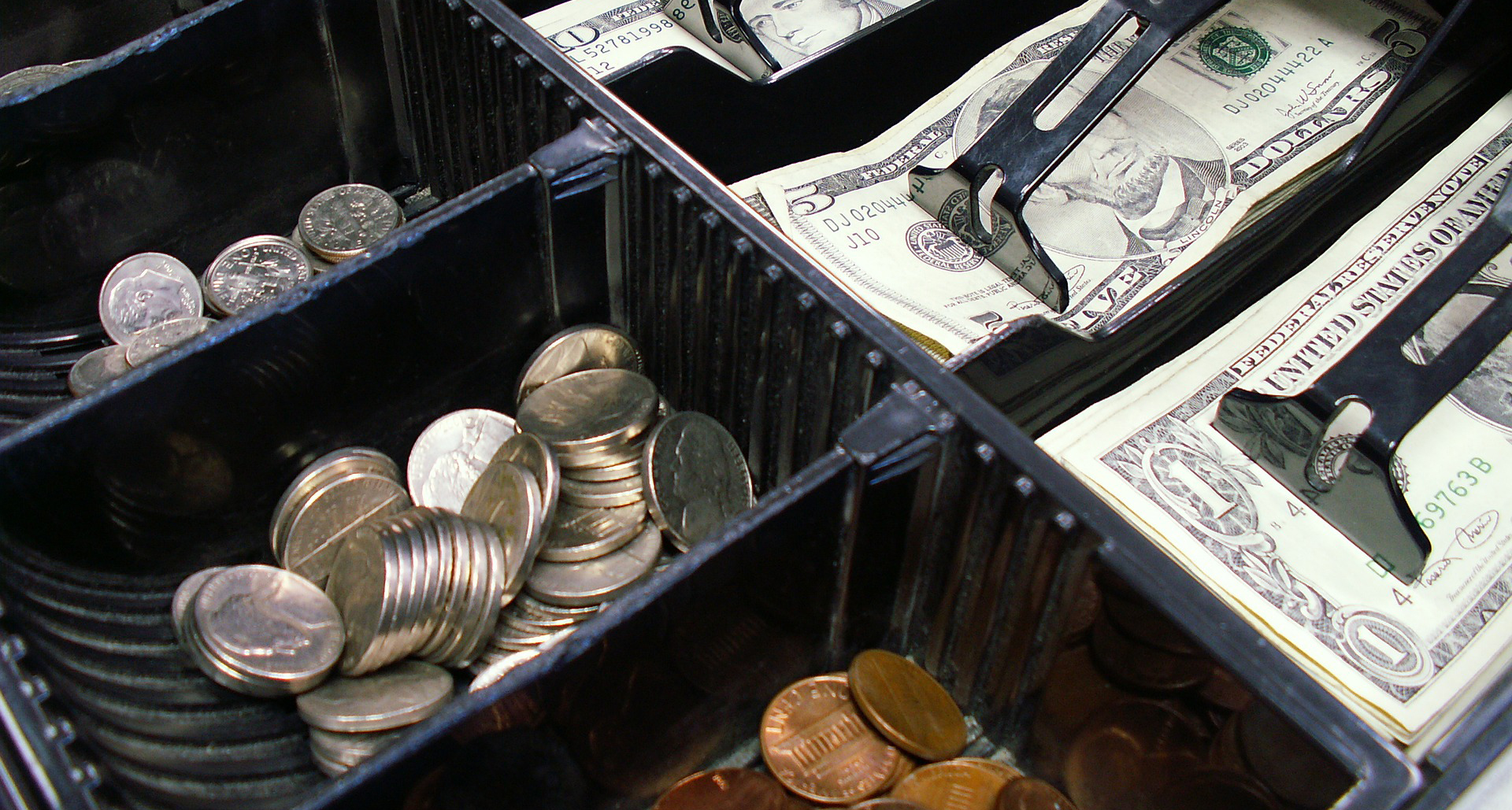 US money in cash register drawer