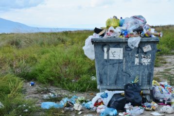 Garbage overflowing outside