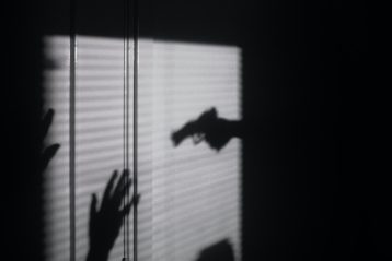 Gun pointing shadow