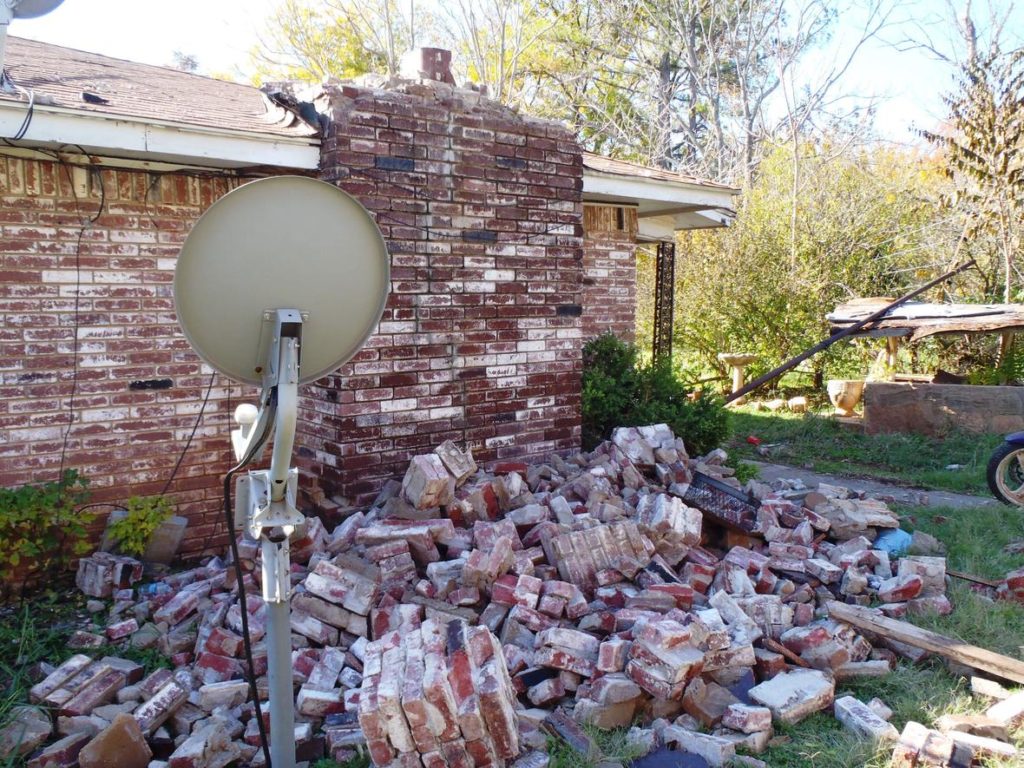 Human caused earthquake damage, pile of bricks