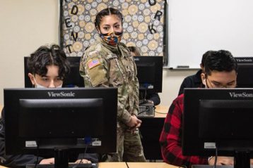 National Guard teaching computer class